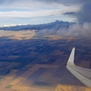 Flying around dark clouds of a storm.