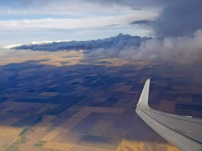 Flying around dark clouds of a storm.